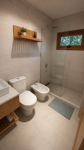 Baño secundario con ducha y ventana al bosque